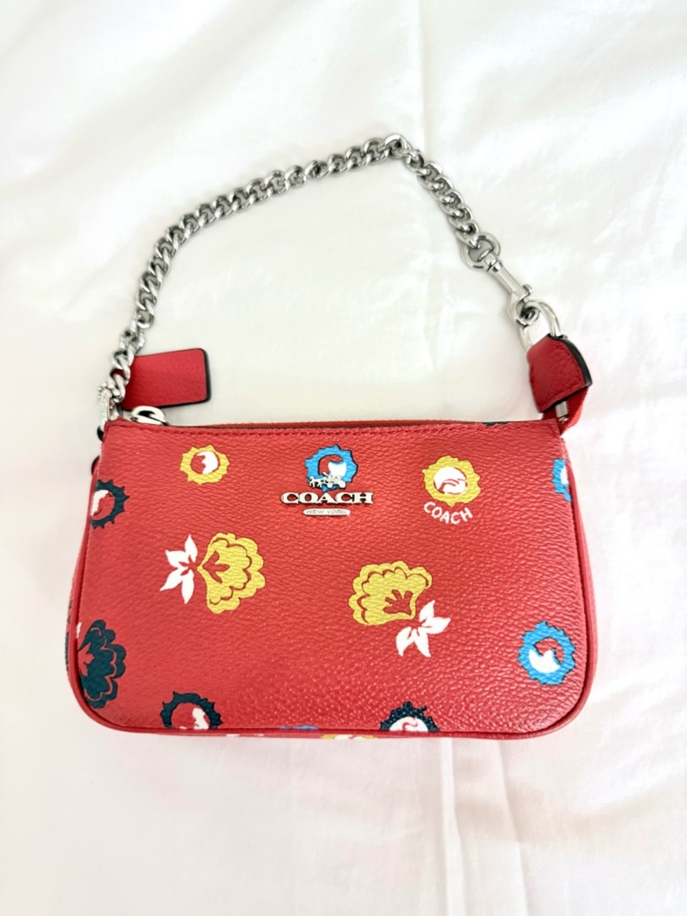 Coach Orange Floral Leather Mini Wristlet with Silver Chain